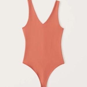 Brand new Coral bodysuit